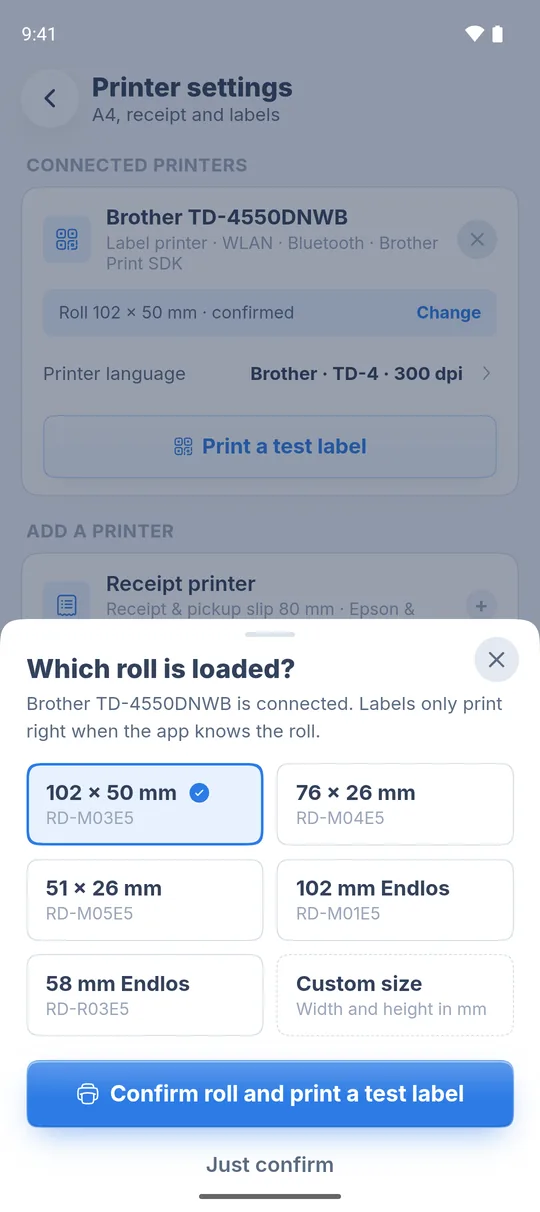 “Which roll is loaded?” sheet with the roll sizes and “Confirm roll and print a test label”